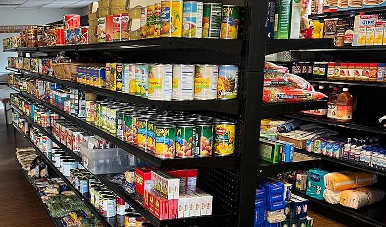 Shelves of canned food items in McFarland Food Pantry